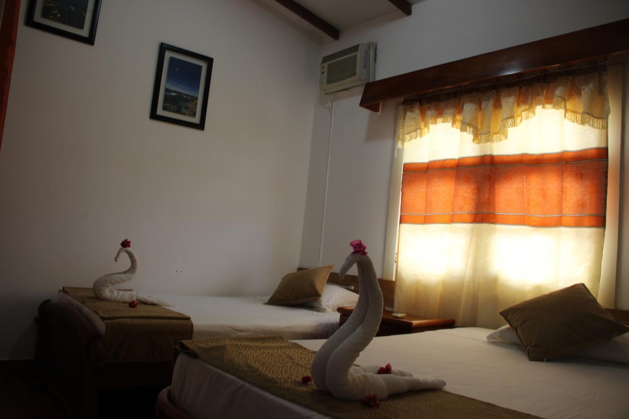 Hotel Crossman بويرتو أيورا المظهر الخارجي الصورة