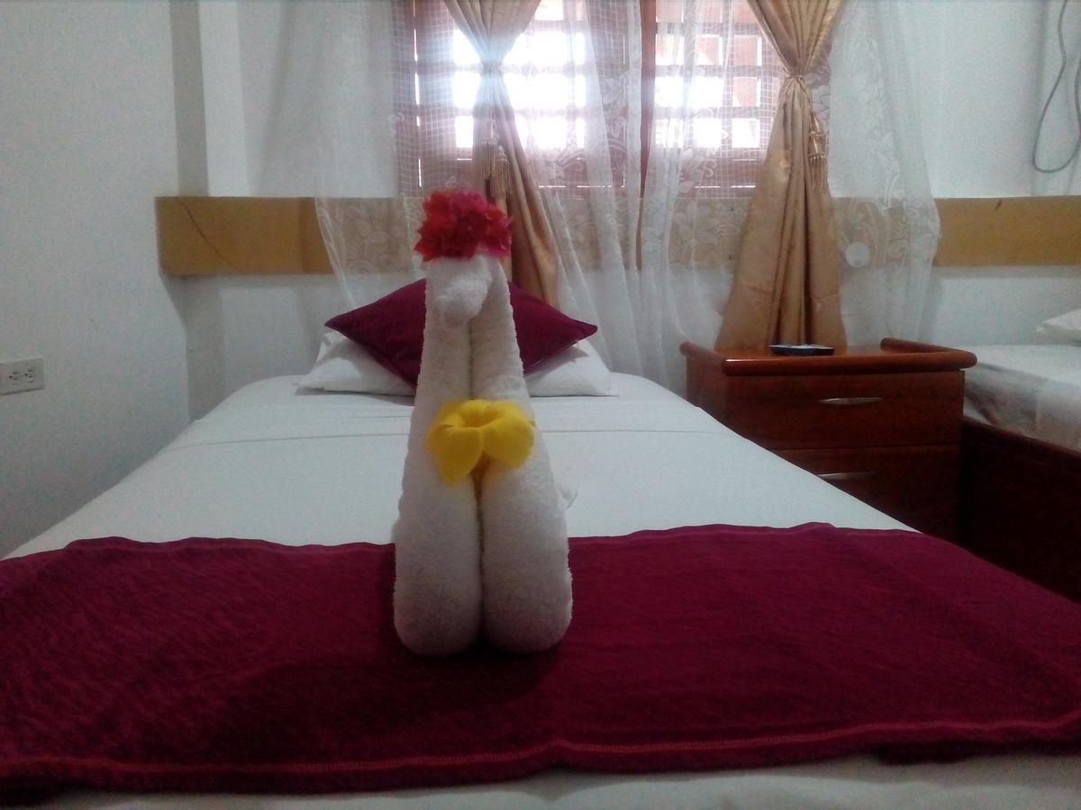Hotel Crossman بويرتو أيورا المظهر الخارجي الصورة